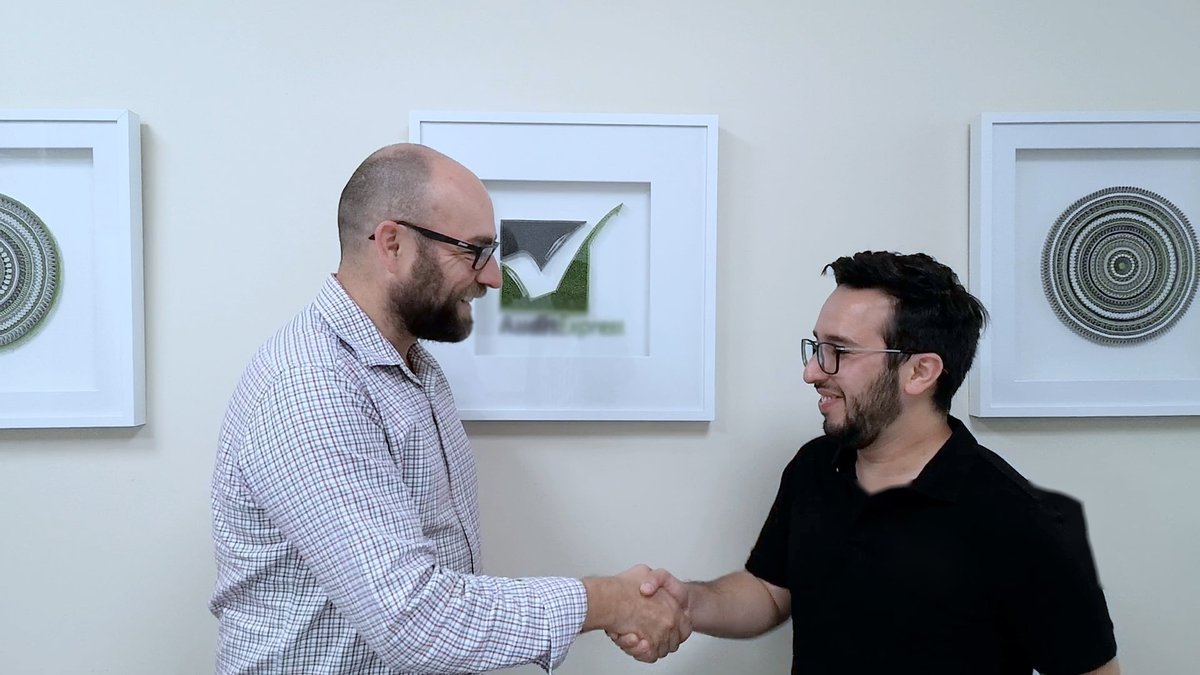 Luis from Mora IT with a Melbourne business client